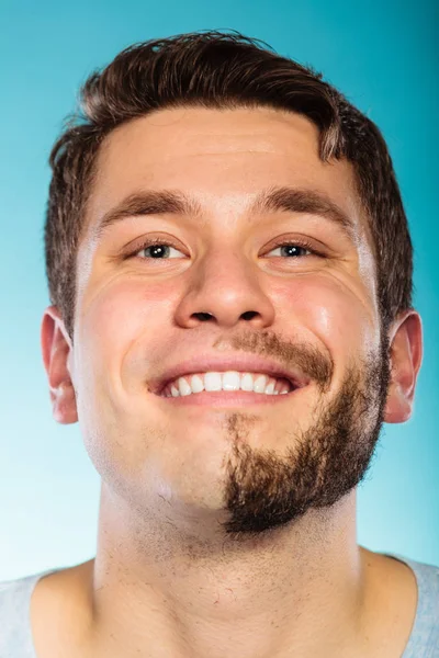 Happy man with half shaved face beard hair. — Stock Photo, Image