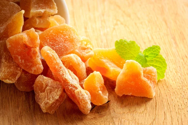 Closeup candied dried ginger in white bowl — Stock Photo, Image