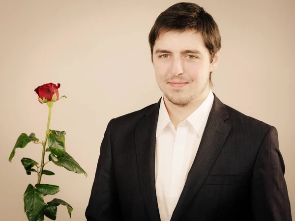 Handsome man with rose — Stock Photo, Image