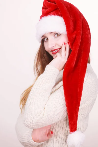 Woman wearing santa claus hat — Stock Photo, Image