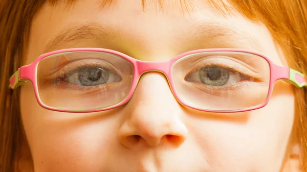Closeup of young toddler girl in eyeglasses Stock Picture