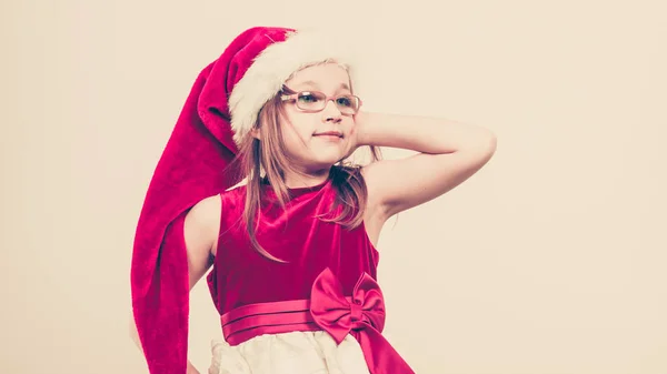 Christmas flicka i santa hatt festlig outfit — Stockfoto