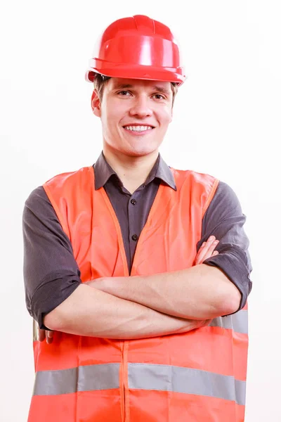 Άνδρας εργαζόμενος σε πορτοκαλί στολή και το κράνος. — Φωτογραφία Αρχείου