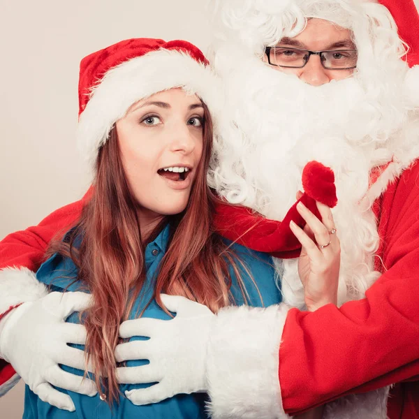 Attractive lady with Santa Claus. — Stock Photo, Image