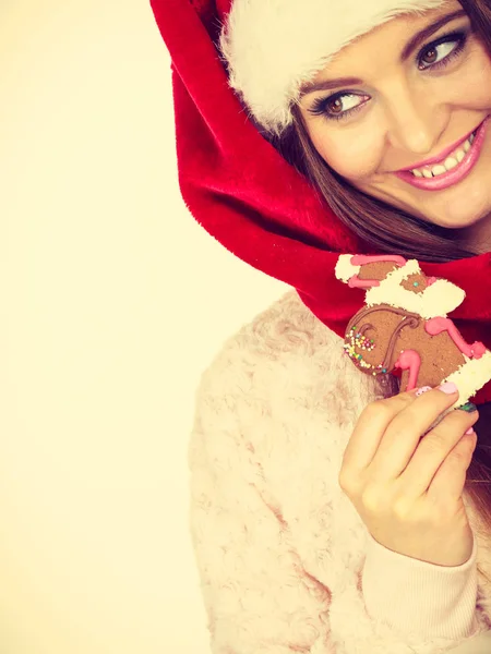 Sombrero Santa Claus mujer con galleta de jengibre. Navidad —  Fotos de Stock