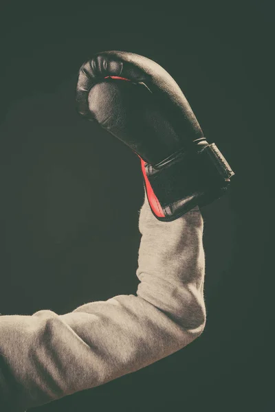 Arm with boxing glove hold in air. — Stock Photo, Image