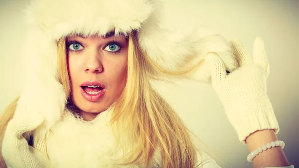 Blonde woman with fur cap. — Stock Photo, Image