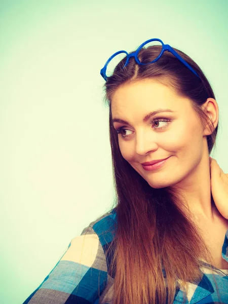 Attractive nerdy woman in weird glasses on head — Stock Photo, Image