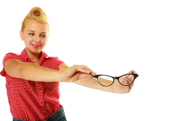 Blonde pin up girl holding retro glasses — Stock Photo, Image