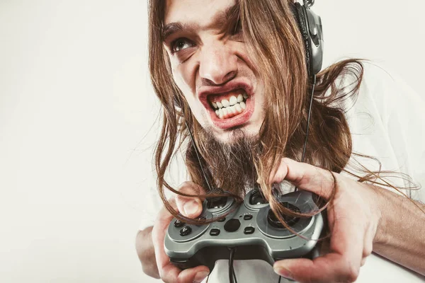 Stressed man playing on pad — Stock Photo, Image