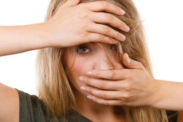 Ashamed embarrassed blonde woman with hands on face — Stock Photo, Image