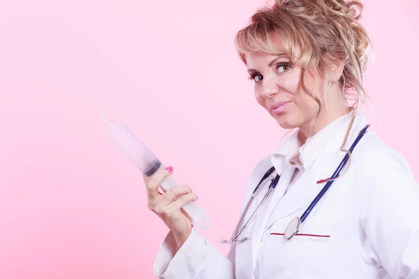 Nurse with big syringe. — Stock Photo, Image