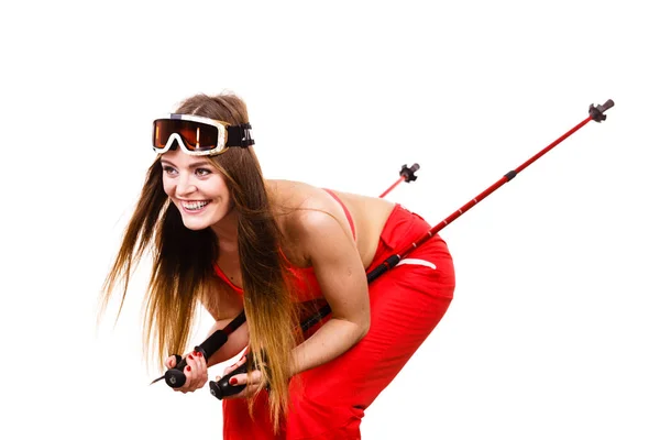 Woman skier in googles with ski poles. Winter sport — Stock Photo, Image