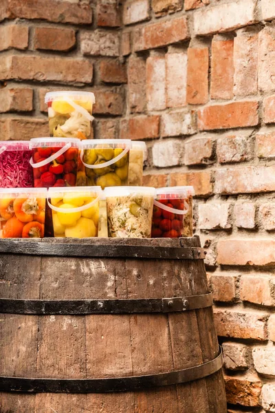 Jars with pickled vegetables in cellar — Stock Photo, Image