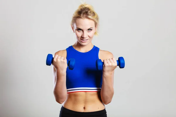 Fit woman lifting dumbbells weights — Stock Photo, Image