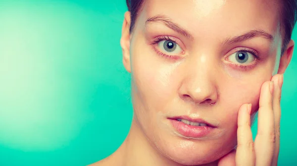 Woman in facial peel off mask. — Stock Photo, Image