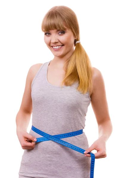 Woman measuring her waist isolated — Stock Photo, Image