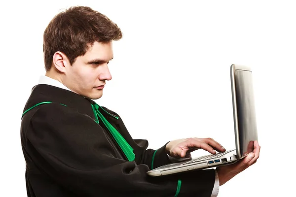 Молодий адвокат тримає ноутбук ПК . — стокове фото
