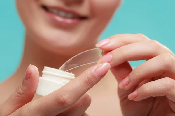 Woman applying balsam for lips — Stock Photo, Image