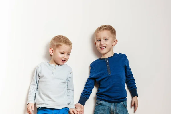 Little boys have fun together at home. — Stock Photo, Image