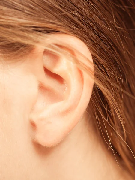 Close up on female ear — Stock Photo, Image