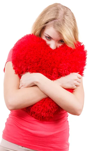 Woman sad girl hugging red heart love symbol — Stock Photo, Image