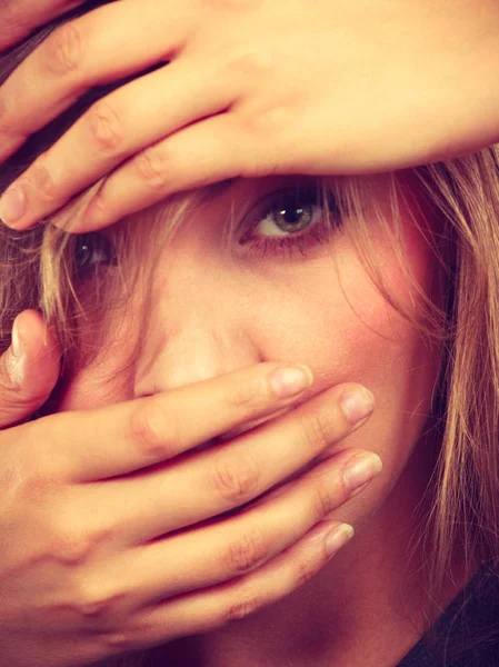 Ashamed embarrassed blonde woman with hands on face — Stock Photo, Image