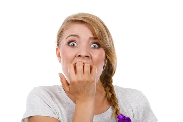 Scared, stressed woman biting her nails Royalty Free Stock Photos