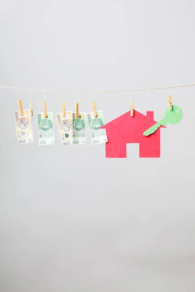 House with key and banknotes — Stock Photo, Image