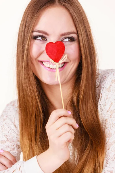 Mooie vrouw met hartvormige hand stok — Stockfoto