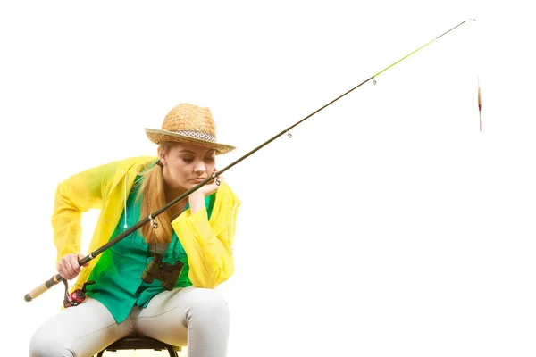 Mulher com haste de pesca, equipamento de fiação — Fotografia de Stock