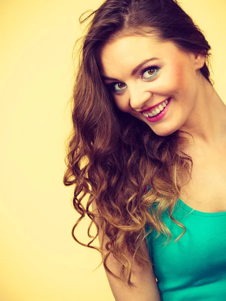 Portrait, young woman wearing colorful makeup and blue top — Stock Photo, Image