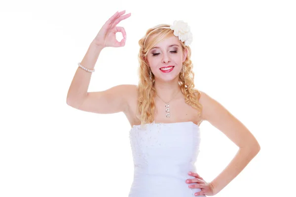 Happy bride in white dress showing a ok sign — Stock Photo, Image