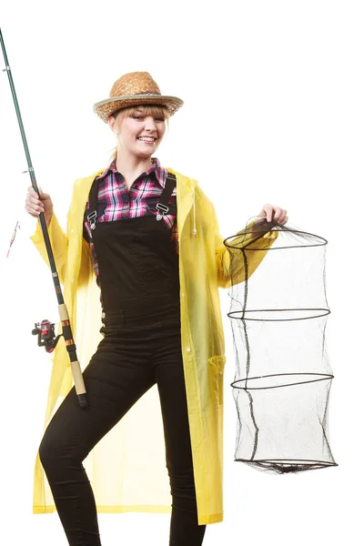 幸福的女人，拿着钓鱼竿和 keepnet — 图库照片