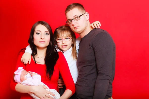 Toddler girl, father and mother holding newborn baby — Stock Photo, Image