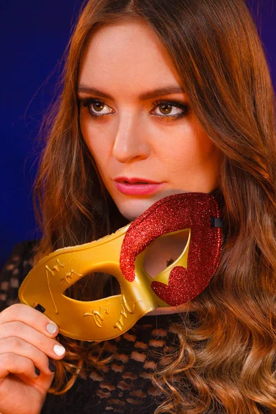 Closeup woman face with carnival mask on dark — Stock Photo, Image