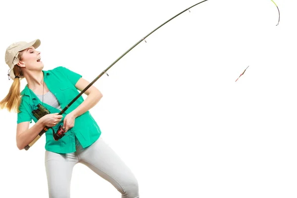 Woman In Shirt Looking At Fishing Rod Stock Photo - Download Image