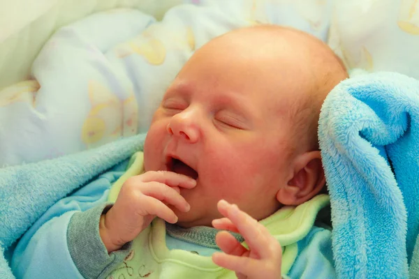 Little newborn baby sleeping in pajamas — Stock Photo, Image