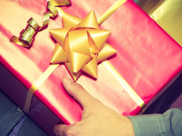 Male hands with many presents gift boxes — Stock Photo, Image