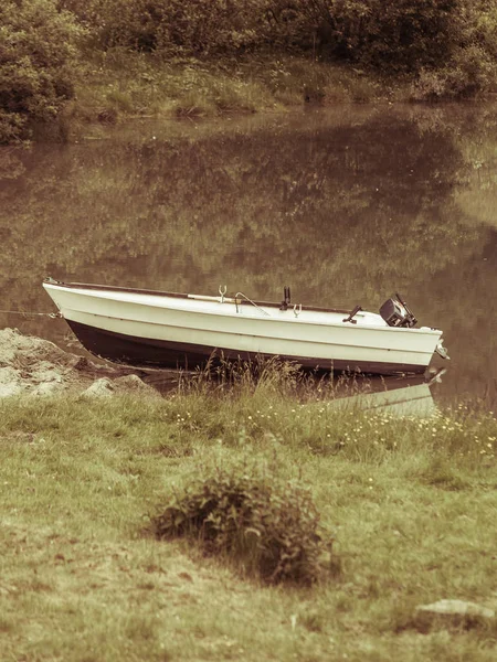 Little boat on water shore — Stock Photo, Image