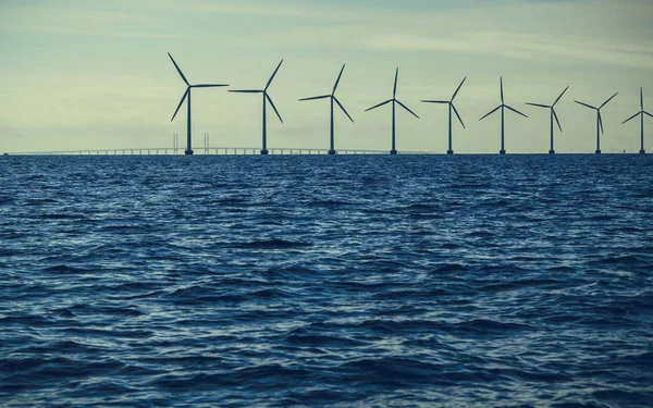 Wind turbines power generator farm along coast sea — Stock Photo, Image