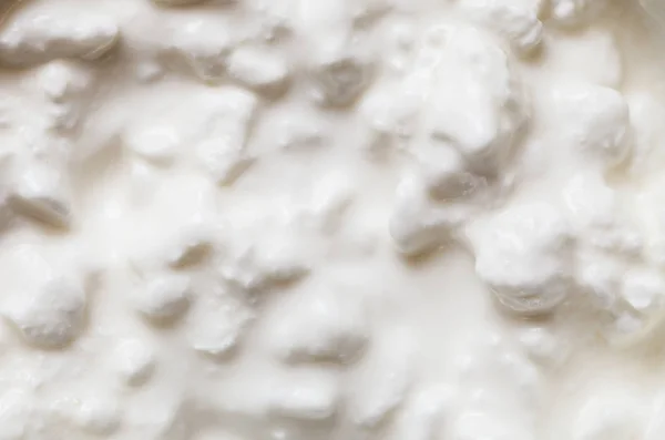 Szczegółowe zbliżenie jogurt z wzrost — Zdjęcie stockowe