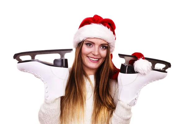 Woman santa claus with ice skates — Stock Photo, Image