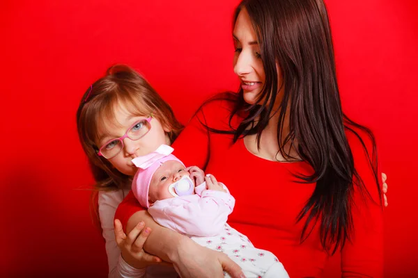 Mother with toddler daughter and newborn baby — Stock Photo, Image