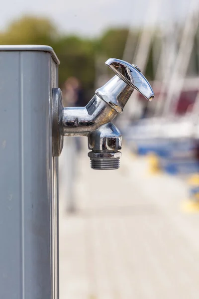 Small metal tap water outside — Stock Photo, Image