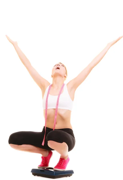 Disappointed woman on weighing scale. Slimming. — Stock Photo, Image