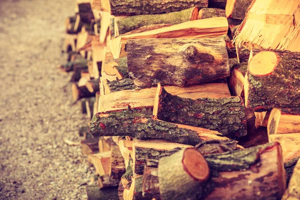 Firewood, pile of wood standing outside — Stock Photo, Image