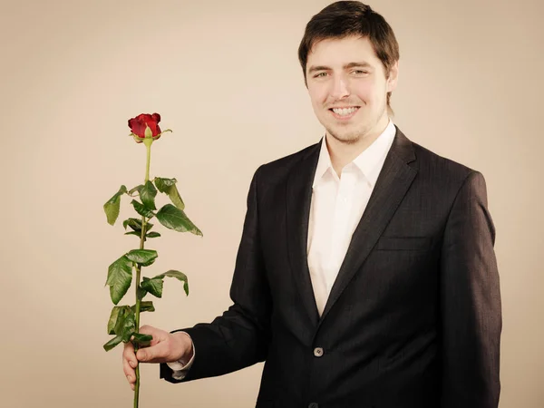 Handsome man with rose — Stock Photo, Image