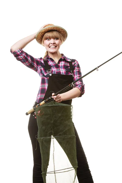 幸福的女人，拿着钓鱼竿和 keepnet — 图库照片