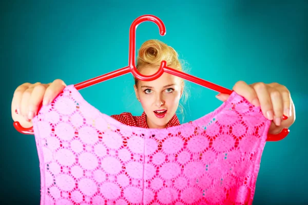 Retro vintage woman holding hanger with top — Stock Photo, Image